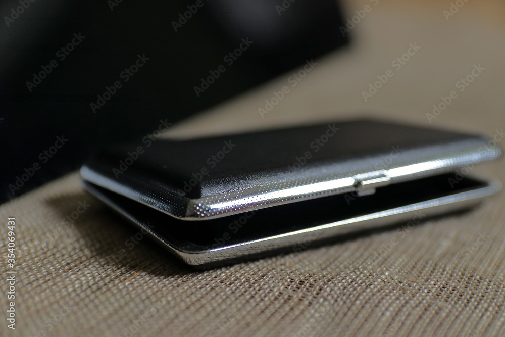 Small black box with metal edging. Selective focus. Small black box with metal edging. Selective focus.