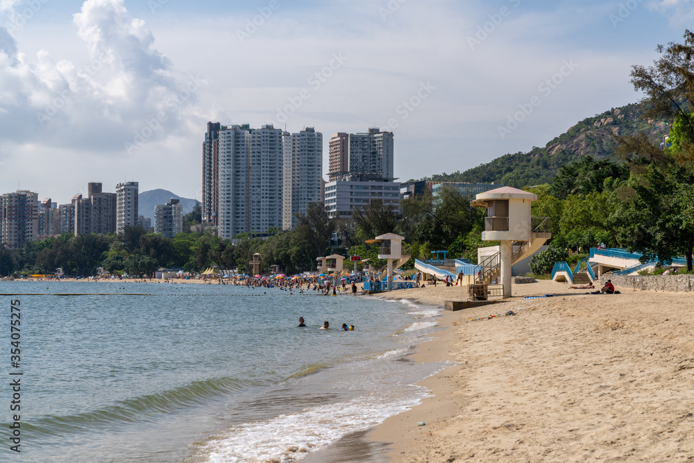Hong Kong, China - May 16 2020: Golden Beach and Cafeteria Beach at Hong Kong Gold Beach. It  is a private housing estate served by Castle Peak Road.