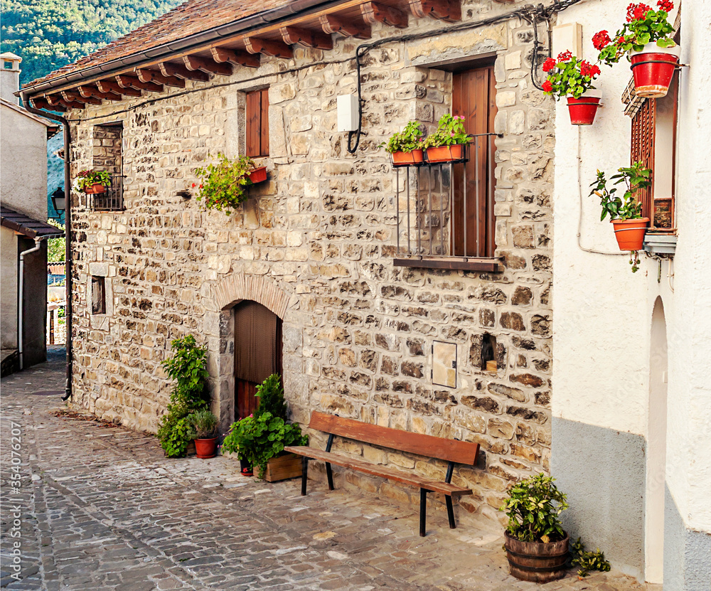 Street of Hechos village in the pyrenees mountains in a sunny day