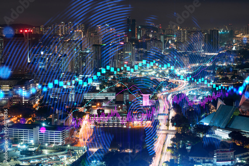 Canvas Print FOREX graph hologram, aerial night panoramic cityscape of Kuala Lumpur