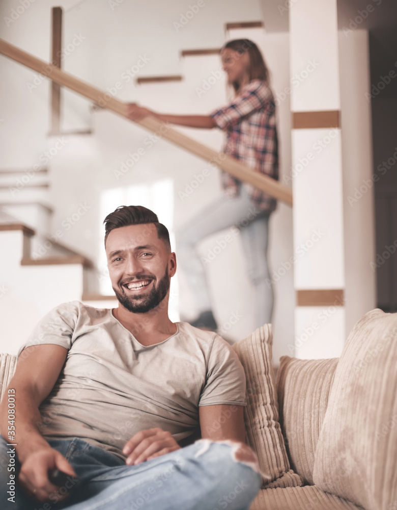 close up. young man sitting on sofa. close up. young man sitting on sofa.