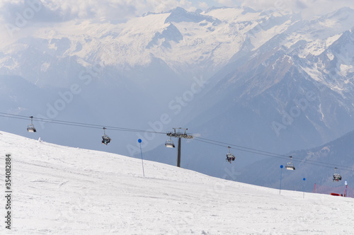 Dolomites Alps mountains in spring with cable car in Italy, Madonna di Campiglio TN