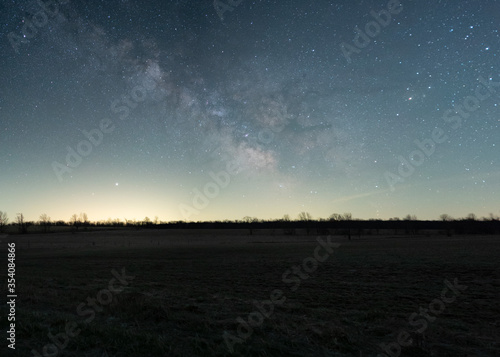 The Milky Way Rises Over A Farm Field
