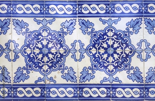 Traditional portuguese azulejo tiles with blue, turquoise and white decoration