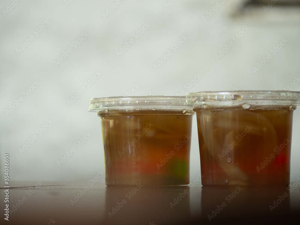 Jelly is packaged in plastic glass. Jelly is packaged in plastic glass.