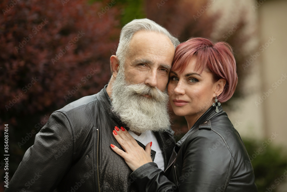 Portrait of beautiful caucasian senior couple posing outdoor. Portrait of beautiful caucasian senior couple posing outdoor.