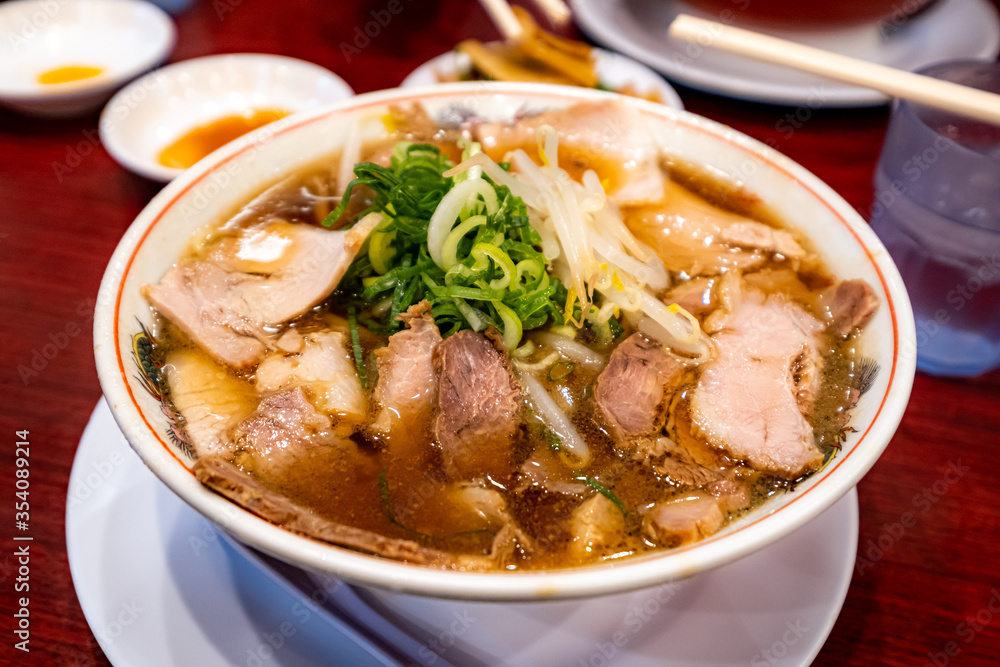 Pork Ramen (Chuka Soba, literally means Chinese noodles) in soy sauce based soup Pork Ramen (Chuka Soba, literally means Chinese noodles) in soy sauce based soup