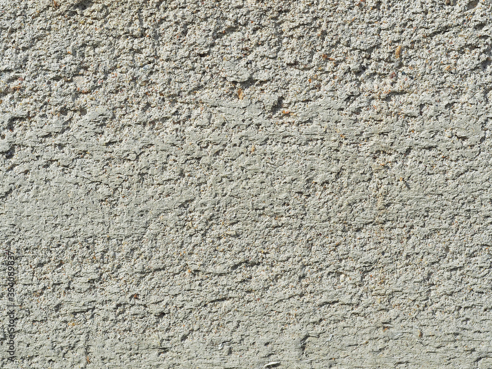 Texture of light grey seamless concrete wall. Can be used as a background Texture of light grey seamless concrete wall. Can be used as a background