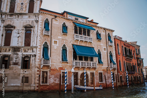 traditional colorful house on the water canals in Venice. High quality photo