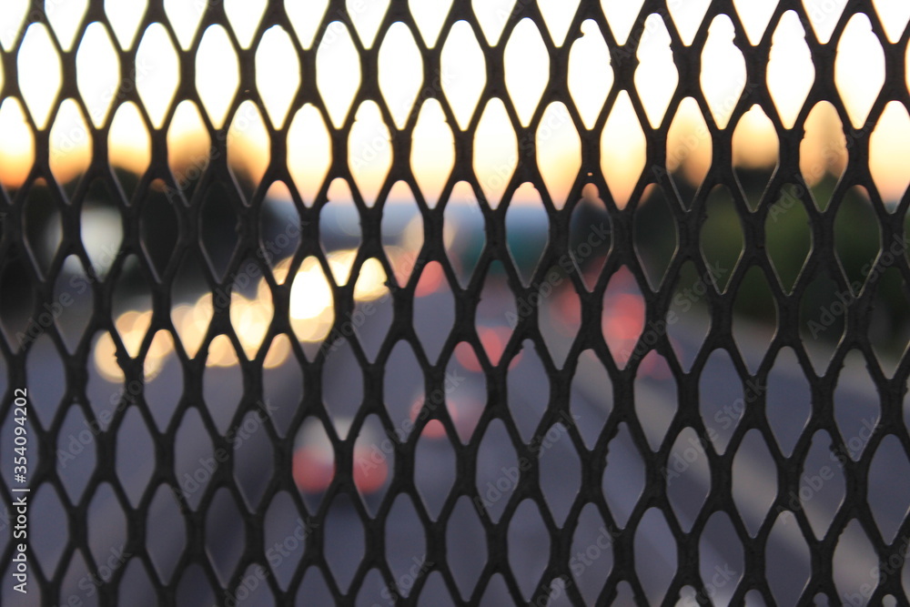 View of the expressway through a protective mesh. USA. View of the expressway through a protective mesh. USA.