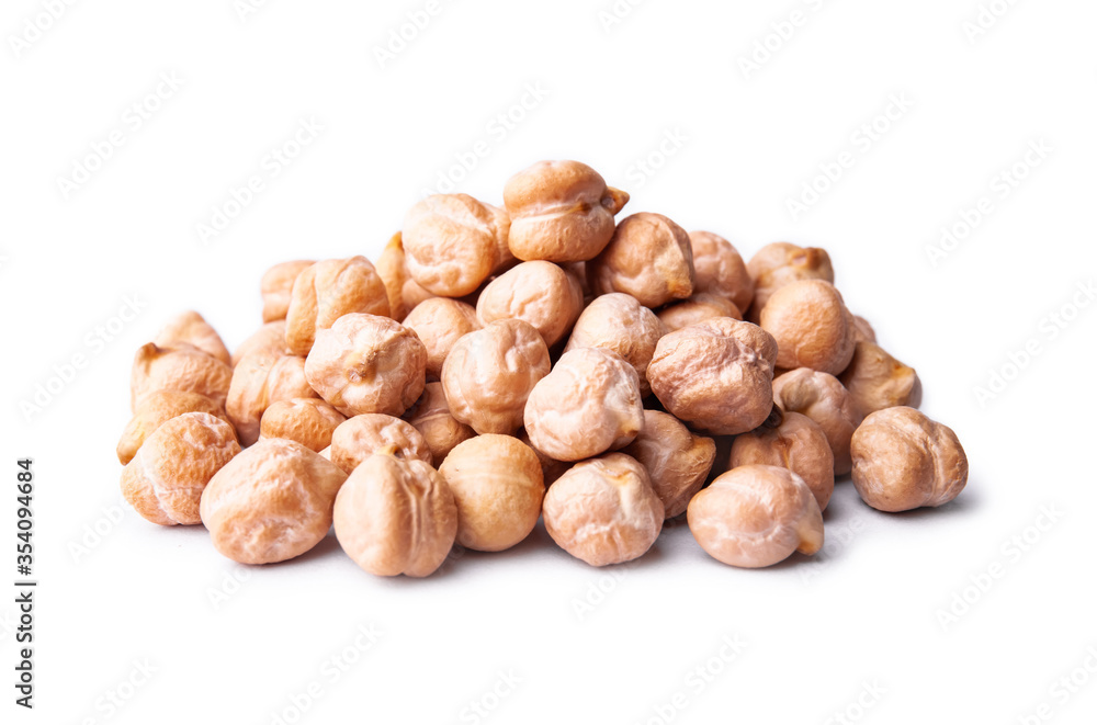 Heap of raw chickpea beans isolated on white background. Healthy vegetarian food concept. Pile of uncooked chickpeas Heap of raw chickpea beans isolated on white background. Healthy vegetarian food concept. Pile of uncooked chickpeas