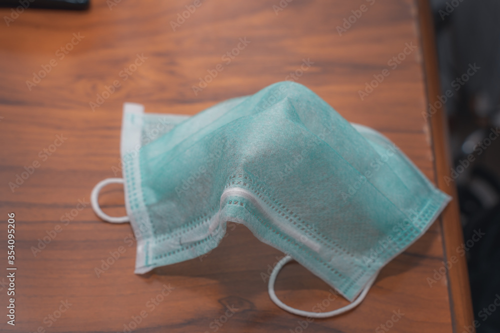Surgical mask disposed improperly. Surgical mask disposed improperly.