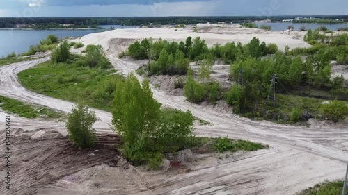 Sand Quarry For The Extraction Of Stone And Sand. A lake formed by sand mining