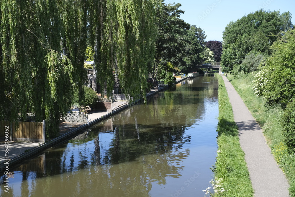 Canal tow path walk in trees