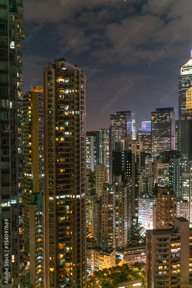 The amazing night and sunset view of cityscape and skyscrapers in Hong-Kong