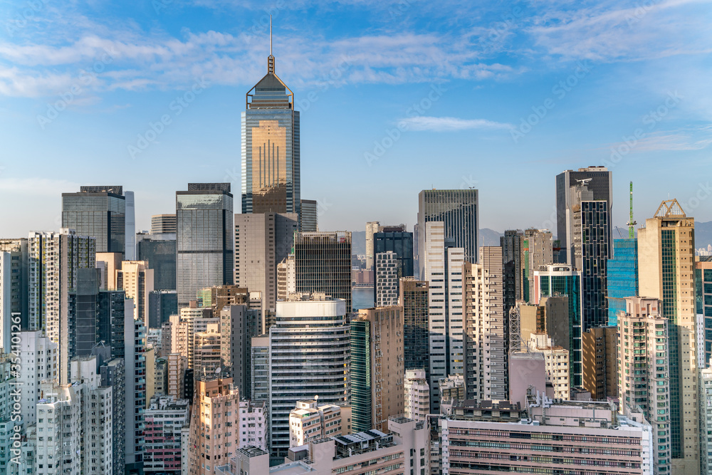 The amazing view of Hong-Kong cityscape full of skyscrapers from the rooftop.