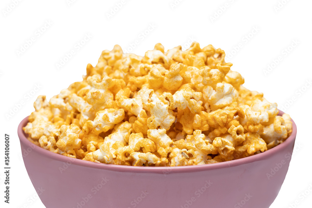 Popcorn in pink big bowl isolated on white background. Unhealthy food concept. Health promotion concept. Popcorn in pink big bowl isolated on white background. Unhealthy food concept. Health promotion concept.