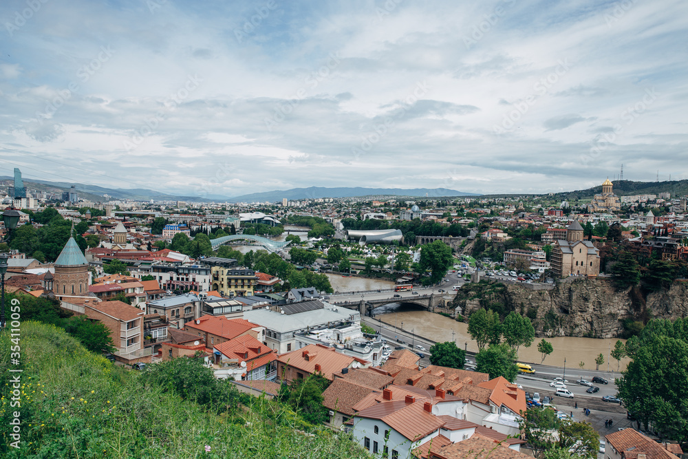 Panoramic view of the city of Tbilisi from the Narikala fortress, the old city and modern architecture. Tbilisi is the capital of Georgia