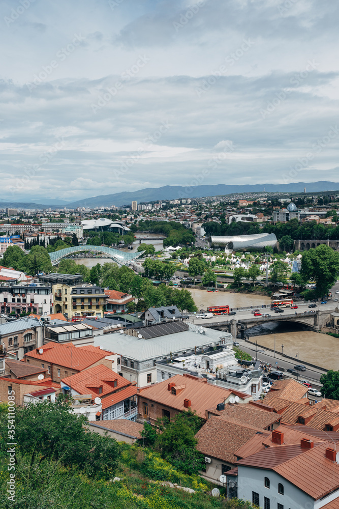 Panoramic view of the city of Tbilisi from the Narikala fortress, the old city and modern architecture. Tbilisi is the capital of Georgia