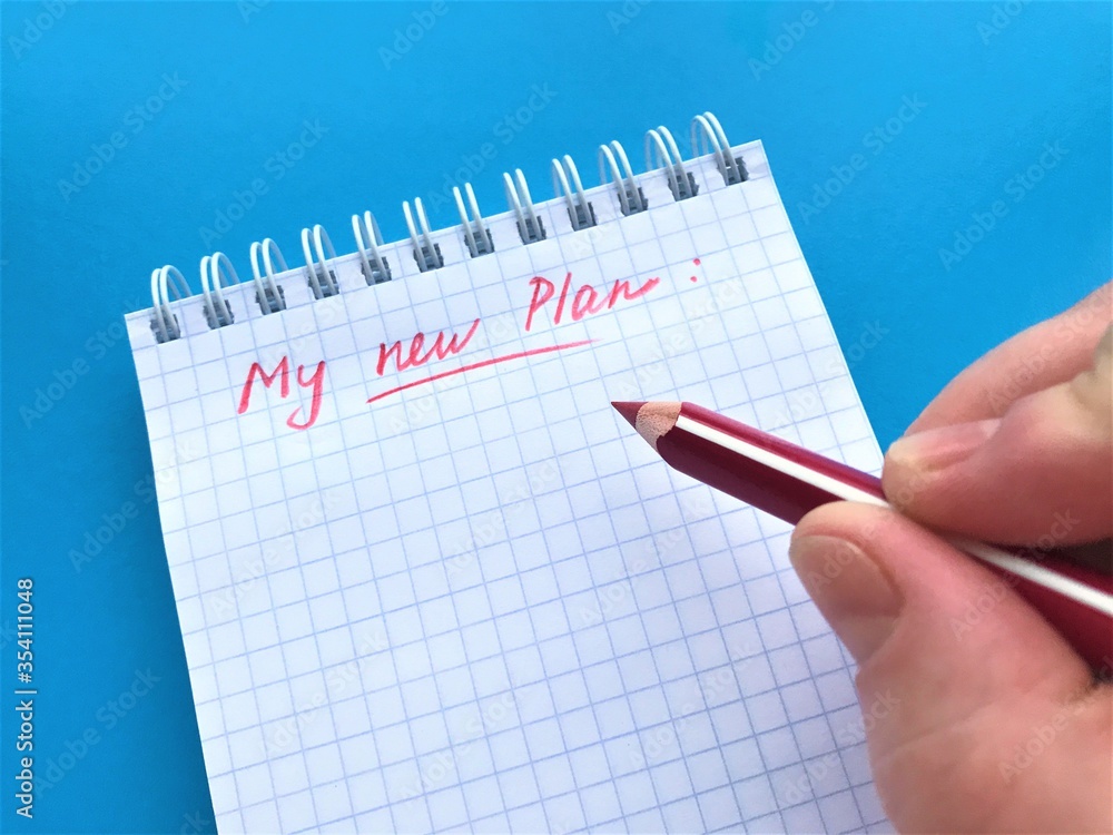 In a spiral notebook in a cage in red pencil is written In a spiral notebook in a cage in red pencil is written