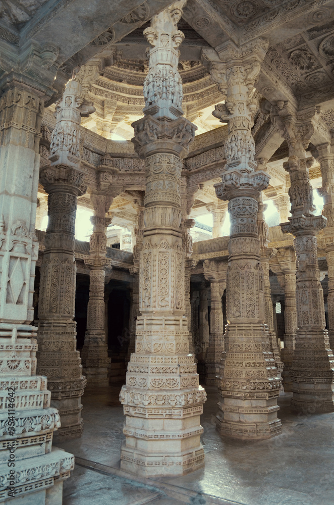 carved columns of white marble in the temple of Ranakpur, India