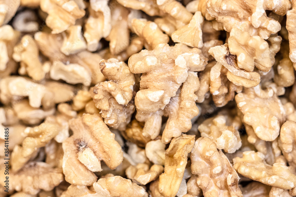 rich pile of tasty walnuts rich pile of tasty walnuts