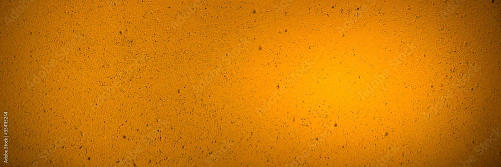 Orange painted wall texture. Panoramic orange wall background Orange painted wall texture. Panoramic orange wall background