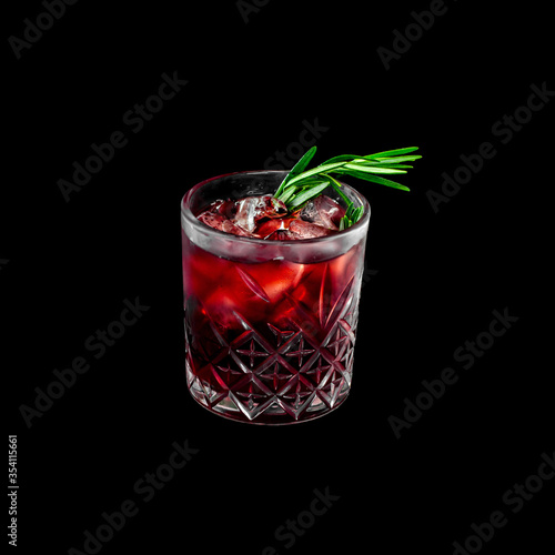 fresh alcohol coctail with fruits on the black background