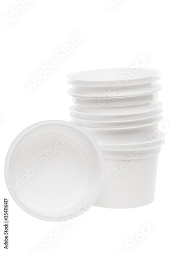 Plastic packaging from yogurt disposable plastic cup on a white background