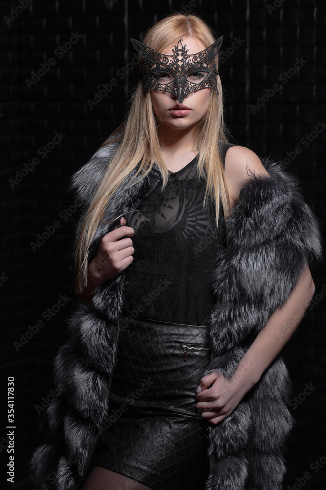 Young cute blonde in a mask Young cute blonde in a mask