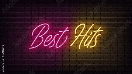 Neon Best Hits, lettering. Neon text of Best Hits on black brick background