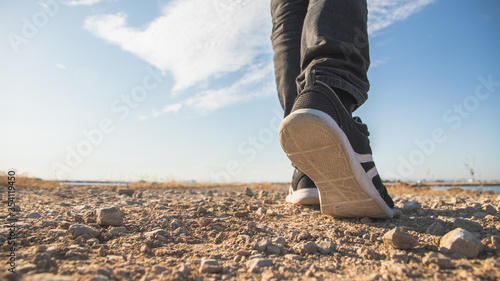 Close-up of feet walking