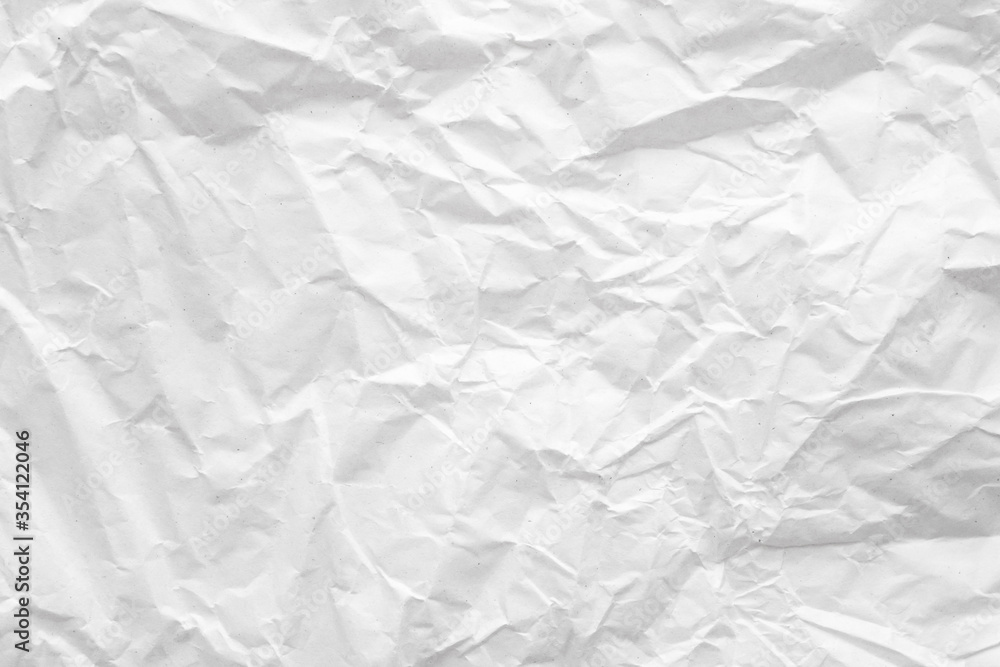 Fototapeta premium White crumpled paper abstract background texture