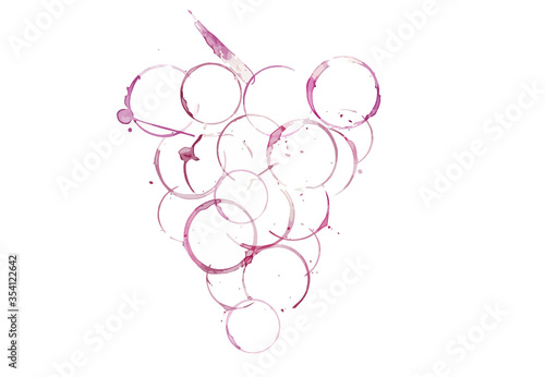 Stains from wine glasses form the shape of a bunch of grapes with a stem. Isolated on a white background.
