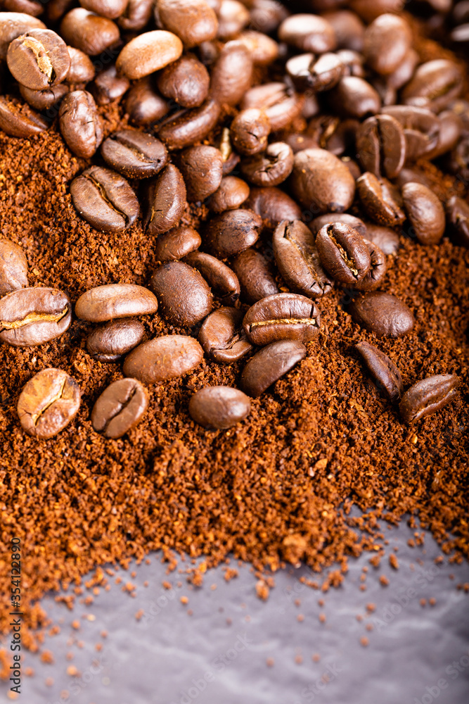 Coffee Beans and Grounds Close up. Background. Coffee Beans and Grounds Close up. Background.