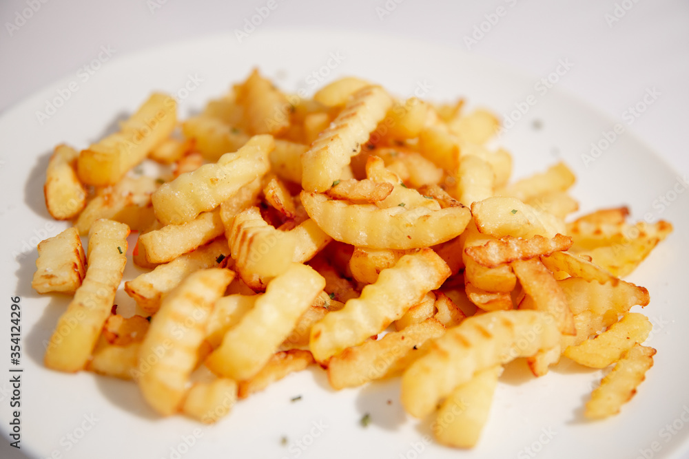 Chips, chrinkle chips cooked, french fries food Chips, chrinkle chips cooked, french fries food