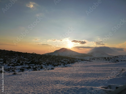 sunset over the mountains in Greece © DIMITRIOS