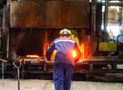 industrial worker welding steel