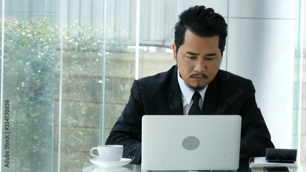 young business man using laptop computer. 4k video young business man using laptop computer. 4k video
