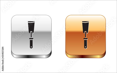 Black Putty knife icon isolated on white background. Spatula repair tool. Spackling or paint instruments. Silver-gold square button. Vector Illustration.