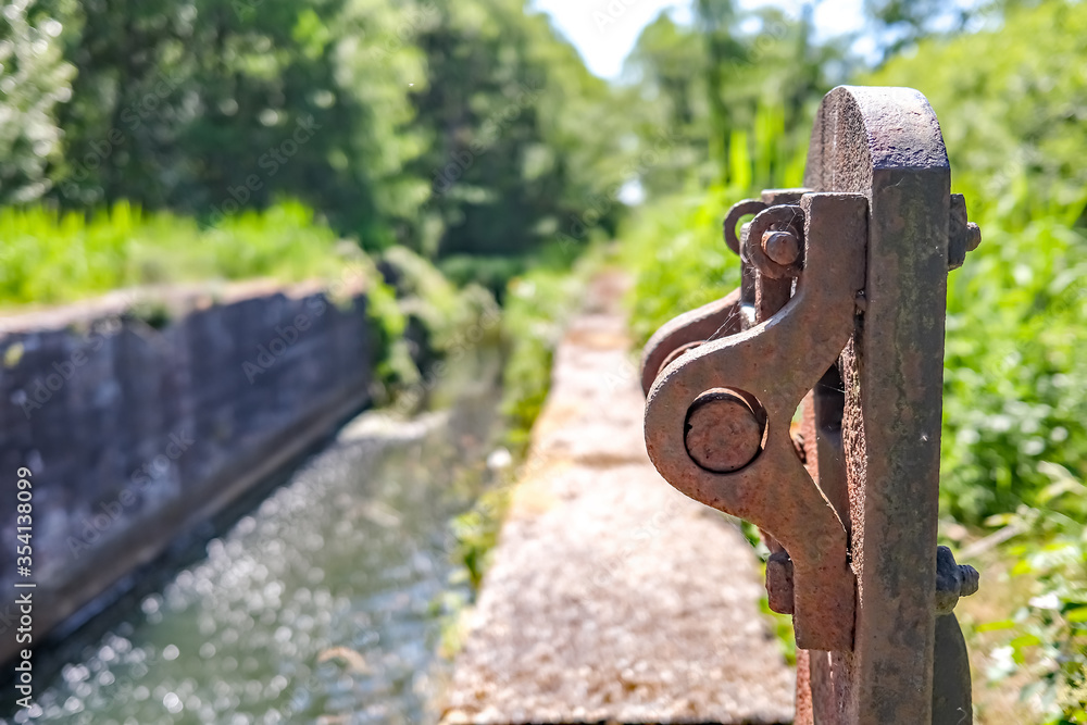  The rusty remains of the historical lock gate opening and closing mechanism at Honing lock on the Honing and Dilham canal