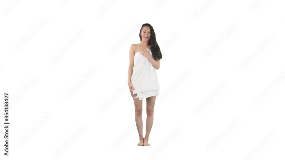 Love concept. Lovely young woman wet in towel sending air kiss and receiving kiss on cheek isolated on solid white background. Love concept. Lovely young woman wet in towel sending air kiss and receiving kiss on cheek isolated on solid white background.