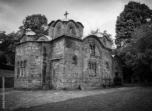 Church of Sveti Pantelejmon in black and white  in Skopje (Macedonia) with tree and garden. photo