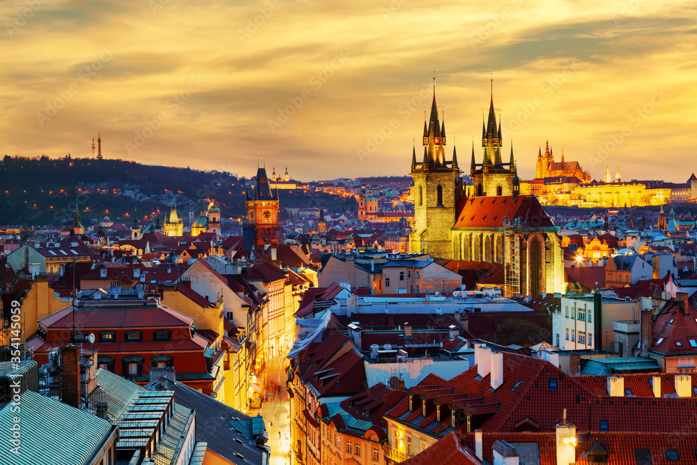 Amazing cityscape view of Prague Castle and church of our Lady Tyn, Czech Republic during sunset time. View from powder tower. World famous landmarks in Europe.