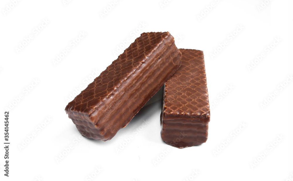Two chocolate coated wafers isolated on white background. Tasty dessert Two chocolate coated wafers isolated on white background. Tasty dessert
