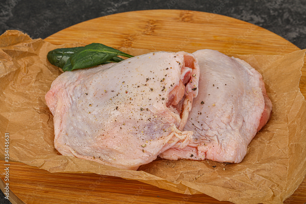 Raw chicken hip with spices