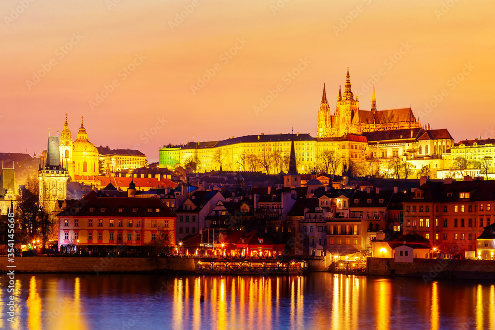 View of Prague Castle and Vltava river in Prague, Czech Republic during sunset time. World famous landmark in Europe.
