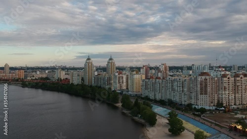 Wallpaper Mural Aerial photography. Obolonskaya embankment in the spring in Kiev. Many houses built along the Dnieper Bay. Drone. Torontodigital.ca