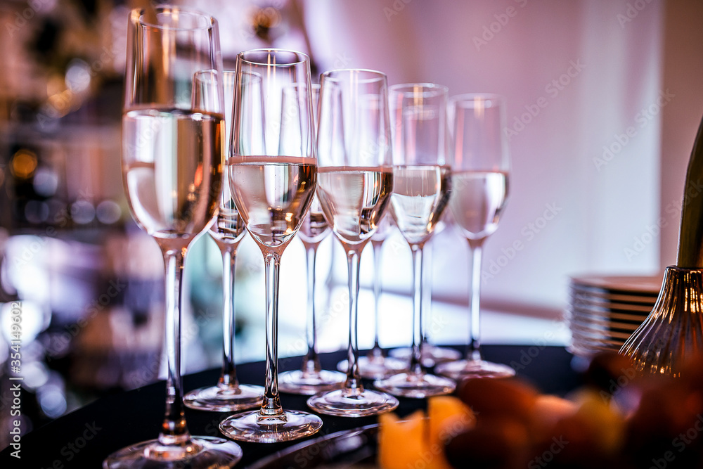glasses of champagne on table. blurred background glasses of champagne on table. blurred background