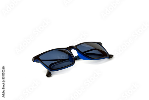Blue sunglasses isolated on a white background.